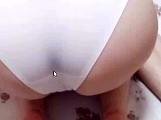 Wife Watches Game While Sucking Cock