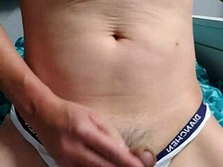 Gay boy masturbates in his underwear excitedly.