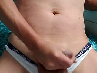 Gay boy masturbates in his underwear excitedly.