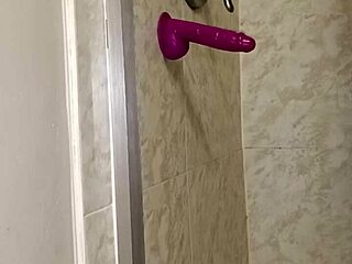 latina guy fucks dildo in bathroom