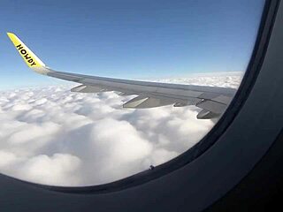 Teen brunette amateur sucks cock in outdoor airplane handjob, swallowing cumshot