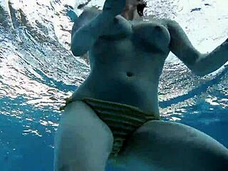 lada poleshuk underwater show big tits short hair in pool bathroom bath.