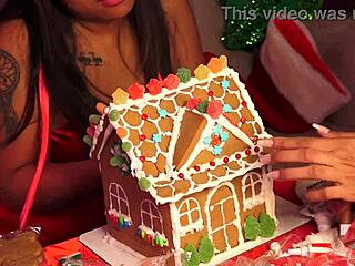 making gingerbread house with friends at christmas