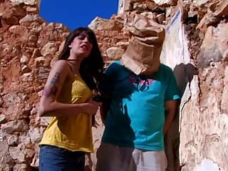 Enjoying a relaxing public vacation with intimate moments.