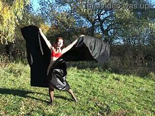 Mature Woman Dances In Bikini Outdoors With Natural Tits!