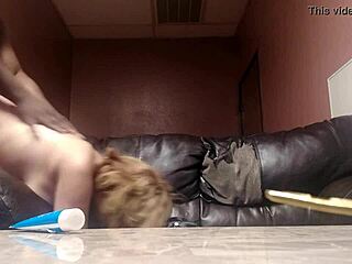 couple relaxes on sofa intimately