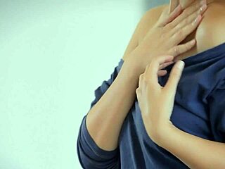 Solo sweetheart fingers her puffy pussy with dildo