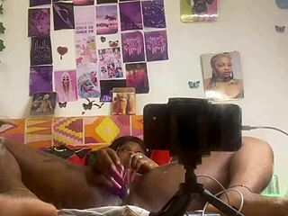 She masturbates pussy with dildo, fingering doggystyle in front of mirror