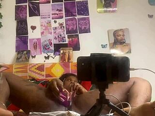 She masturbates pussy with dildo, fingering doggystyle in front of mirror