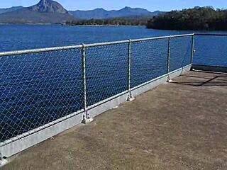 Hey, that Asian slut JJ is masturbating on the dam outdoors