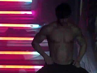 handsome brazilian stripper performs clothes ripped striptease in front of audience