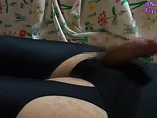 Wearing garter stockings, masturbating on swimsuit crotch, then ejaculating