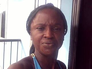 Look at this crazy bitch twerking her ass on the balcony for everyone to see