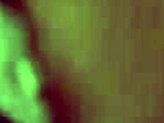 Brunette milf masturbates in black stockings while fingering her shaved pussy