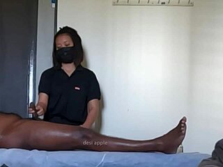 Spa girl jerks fat cock to satisfy client, ensuring full relaxation and pleasure in the spa