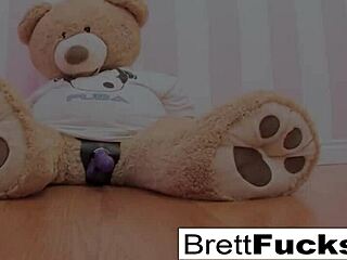 Busty blonde Brett Rossi raw plays with stuffed bear strap-on dildo!