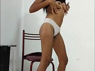 latina brunette with natural tits shakes her sexy hips