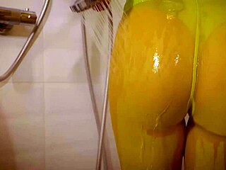 Pornstar teases with wet, clinging clothes