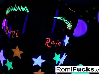 Romi Rain and Dani tease in lesbian black-light fun?