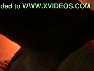 sexy tattooed curvy woman with piercings moaning softly in a relaxed setting