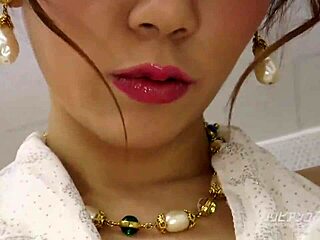 The asian girl shows her big tits in the bubble bath story.