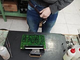 young skinny guy with huge cock blasts cum on machine instead of repair