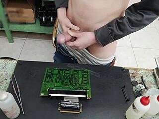 young skinny guy with huge cock blasts cum on machine instead of repair