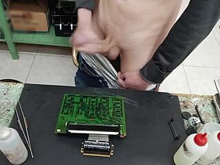 young skinny guy with huge cock blasts cum on machine instead of repair