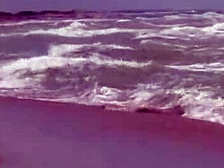 Gorgeous teen Agnes casually bathes her naked body in the ocean, showing big tits.