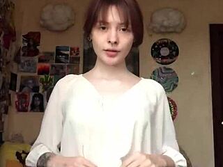 She removes underwear to reveal smooth pussy