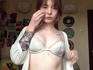 She removes underwear to reveal smooth pussy