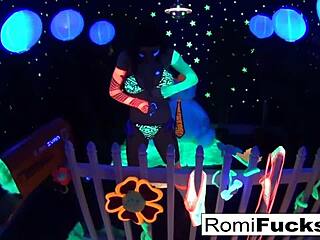 romi rain and dani in lesbian black-light fun with big tits oral and ass play.