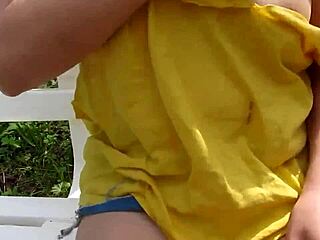 erika flashes big naked tits outdoors in park as exhibitionist milf