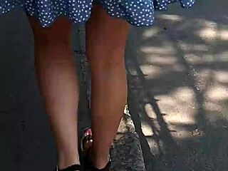 milf flashes naked ass on public street