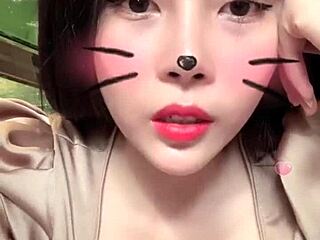 Asian girl shows off big tits in sexy live session