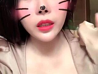 Asian girl shows off big tits in sexy live session