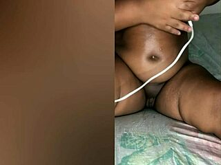 Wow, this Brazilian woman can't wait for her husband on Christmas night! She masturbates wildly with a massager.