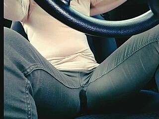 Woman in jeans desperately needs toilet but gets stuck in traffic and wets herself uncontrollably