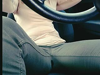 Woman in jeans desperately needs toilet but gets stuck in traffic and wets herself uncontrollably