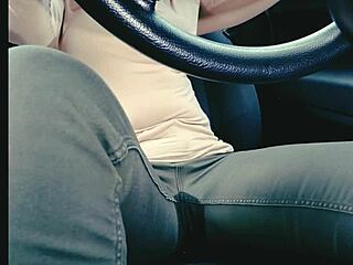 Woman in jeans desperately needs toilet but gets stuck in traffic and wets herself uncontrollably