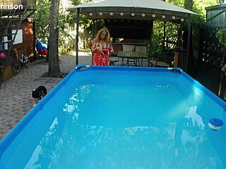 Melissa The Mermaid With Her Tattoo And Brown Eyes By The Pool