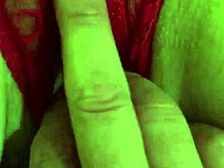 Oh wow, that shaved pussy in red thongs is getting so wet from fingering 😏