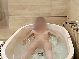 Hey, watch this cute Japanese college student bathing solo with her small tits and skinny body