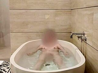 Hey, watch this cute Japanese college student bathing solo with her small tits and skinny body