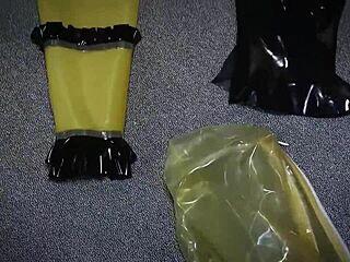 she layered up in three layers of latex and four layers of gloves, then added a gasmask for intense self-bondage play