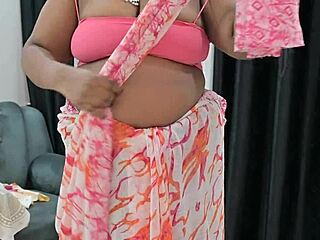 Indian bhabhi reveals her hot boobs in a tantalizing display of curves