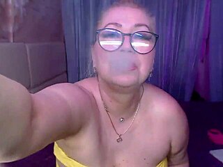 Cool busty vulgar mature whore in glasses with ponytail teases solo with dildo masturbation and squirting orgasm