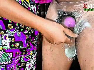 in a close-up homemade scene, the wife gives a handjob with soap leading to cumshot on her.