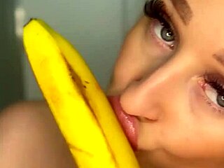 I feel so horny as this college girl sucks eagerly on that big banana