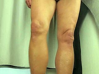 Tempting handjob strokes in the fitting room.